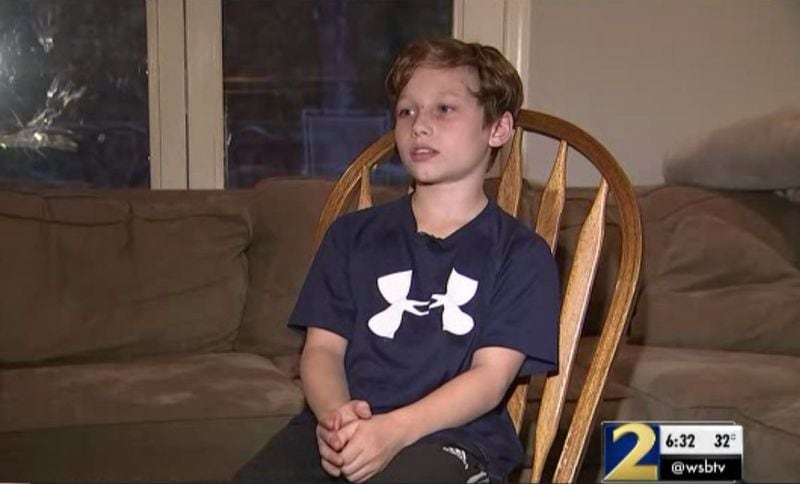 Joe Austin, 10, told Channel 2 Action News he pulled his hand up inside his T-shirt to stay warm. (Photo: Channel 2 Action News)