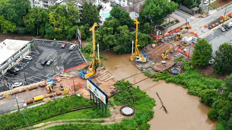 July 21, 2022 Atlanta - Aerial photograph shows construction area where the bridge along Cheshire Bridge Road, which crosses over Peachtree Creek, was demolished after the fire August 4 last year on Thursday, July 21, 2022. (Hyosub Shin / Hyosub.Shin@ajc.com)