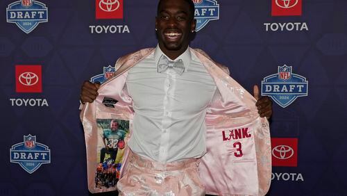Alabama cornerback Terrion Arnold poses on the red carpet ahead of the first round of the NFL football draft, Thursday, April 25, 2024, in Detroit. (AP Photo/Carlos Osorio)
