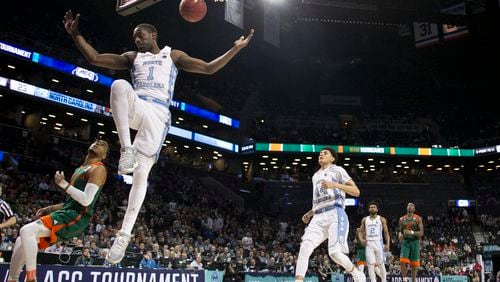North Carolina’s Theo Pinson (1) dunks on a fast break during the first half against Miami in the quarterfinals of the ACC Tournament on Thursday, March 9, 2017, at the Barclays Center in Brooklyn, N.Y. The Tar Heels advanced, 78-53. (Robert Willett/Raleigh News & Observer/TNS)