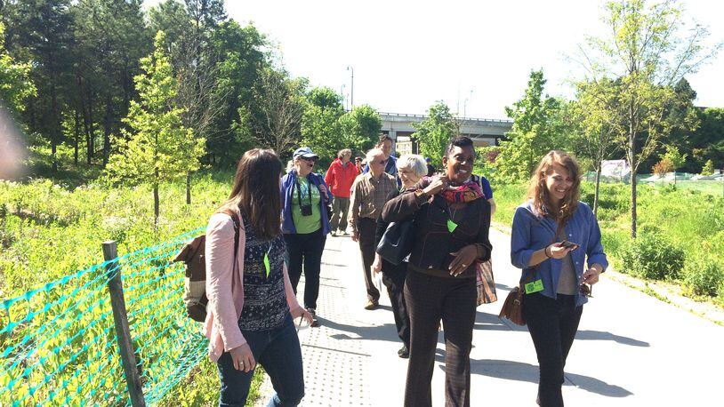 This file photo shows a morning walking tour of the Atlanta Beltline’s Eastside Trail.