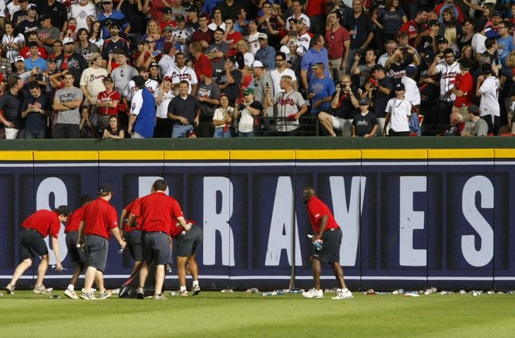 Fans litter field after questionable ruling