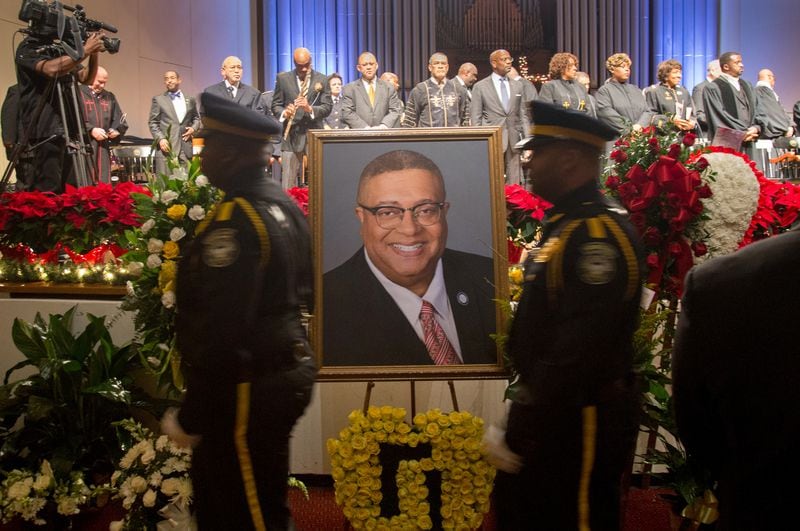 Dignitaries file past a large portrait of Ivory Lee Young Jr. at the start of his funeral service in the Martin Luther King Jr. International Chapel on Morehouse College campus Dec. 1, 2018.  The four-term city councilman from west Atlanta, longtime architect, ordained minister and family man died Nov. 16 from cancer at age 56. (Steve Schaefer for The Atlanta Journal-Constitution)