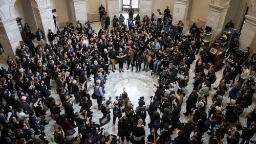 Protestors rally against Supreme Court nominee Judge Brett Kavanaugh in the rotunda of the Russell Senate Office Building on Capitol Hill in Washington on Monday. Christine Blasey Ford, who has accused Kavanaugh of sexual assault, has agreed to testify before the Senate Judiciary Committee on Thursday. Drew Angerer/Getty Images