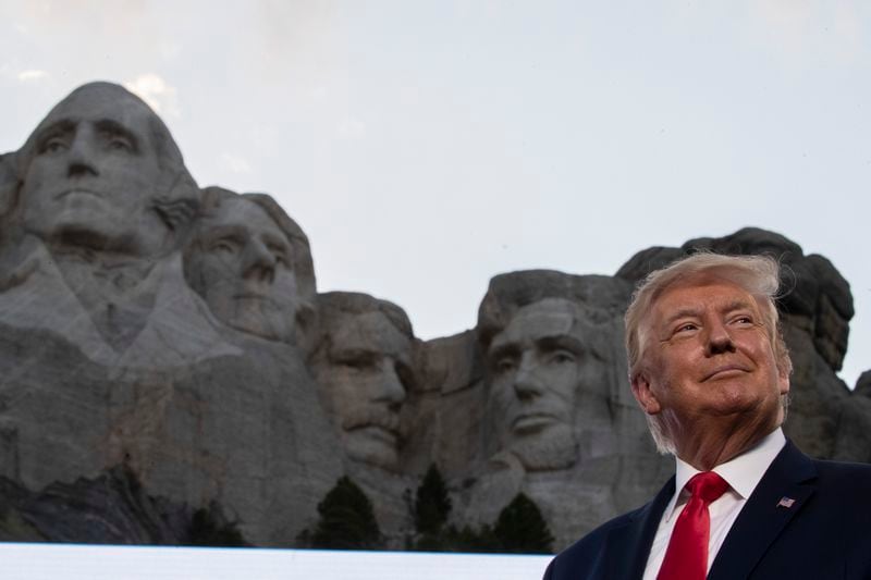 President Donald Trump smiles at Mount Rushmore National Memorial on July 3, near Keystone, South Dakota. (AP Photo/Alex Brandon)