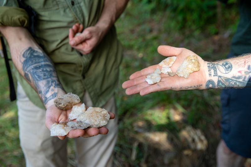 Several piece of worked quartz is found in a short time in the South River area, evidence of Native American trade activity in the South River, on Friday, Sept 1, 2023.  The area is adjacent to the highly contested Atlanta Public Safety Training Center being built.    (Jenni Girtman for The Atlanta Journal-Constitution)