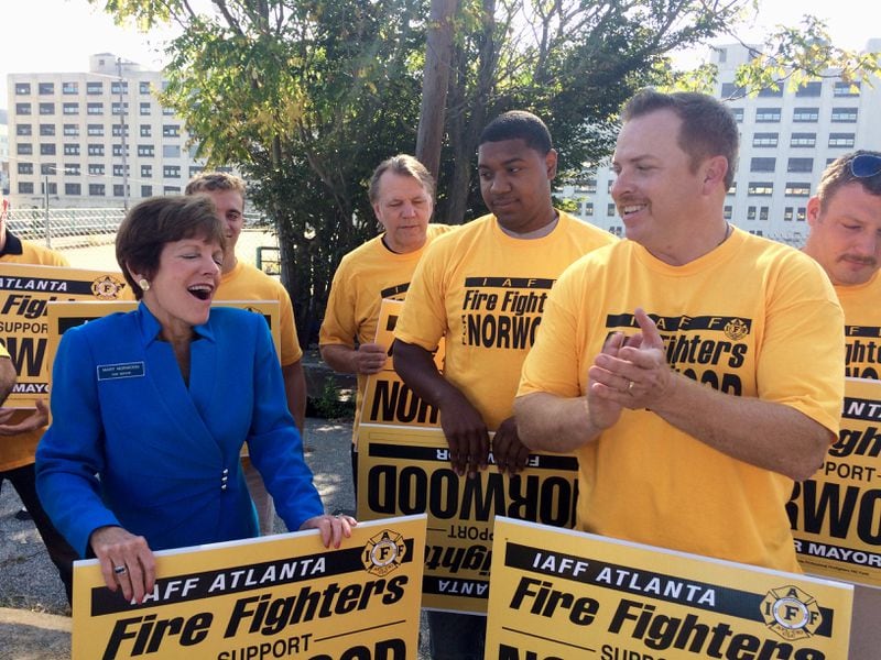 Atlanta City Councilwoman Mary Norwood, left, and International Association of Fire Fighters Local 134 President Paul Gerdis speak during a campaign event Tuesday, Sept. 19, 2017. The IAFF endorsed Norwood in her run for mayor. J. SCOTT TRUBEY/ STRUBEY@AJC.com