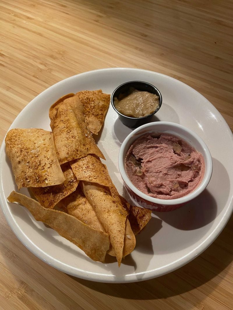 Goat liver mousse, with apple and ginger gelée, apple butter and crackers, is among the "snacky charcuterie" sort of things chef-owner Jarrett Stieber offers at Little Bear. Holly Steel / holly.steel@ajc.com