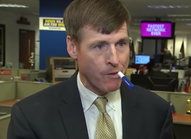 Doctors say a rare neurological condition is making it difficult for Washington correspondent Jamie Dupree's brain to tell his tongue what to do while speaking. Placing a pen in his mouth helps him speak.