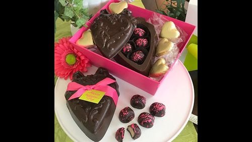 This year s Valentine offerings from Sugar Marsh Cottage include heart-shaped boxes made from dark chocolate and handmade bonbons filled with Chambord cream filling.