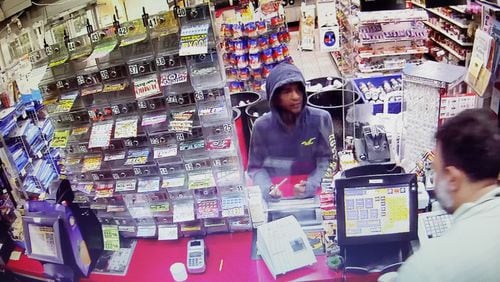 A surveillance photo shows the man Atlanta police are seeking in connection with a deadly shooting in the 1000 block of Cascade Avenue.