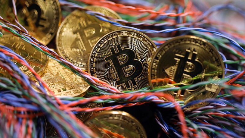 Bitcoin lives on the internet, not as physical currency but that hasn’t stopped traders from driving up the cryptocurrency’s value. Bloomberg photo by Chris Ratcliffe.