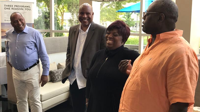 Frank Ski (left) with his boss Rick Caffey, his on-air partners Wanda Smith and Miss Sophia, at the Westin Buckhead for a party to celebrate his return to V-103 on July 2, 2018.
