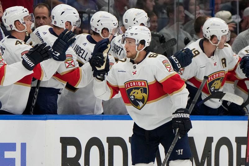 Florida Panthers defenseman Brandon Montour (62) celebrates with the bench after his goal against the Tampa Bay Lightning during the second period in Game 3 of an NHL hockey Stanley Cup first-round playoff series, Thursday, April 25, 2024, in Tampa, Fla. (AP Photo/Chris O'Meara)