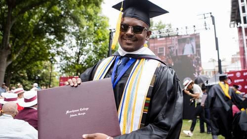 Kareem Michel, an economics major at Morehouse, poses for a portrait during the Morehouse College commencement ceremony on Sunday, May 21, 2023, on Century Campus in Atlanta. Michel is part of AltFinance's first cohort to graduate. CHRISTINA MATACOTTA FOR THE ATLANTA JOURNAL-CONSTITUTION