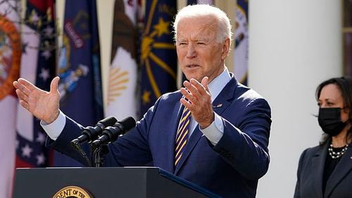 President Joe Biden speaks about the American Rescue Plan, a coronavirus relief package, in the Rose Garden of the White House, Friday, March 12, 2021, in Washington. Vice President Kamala Harris is at right. (AP Photo/Alex Brandon)