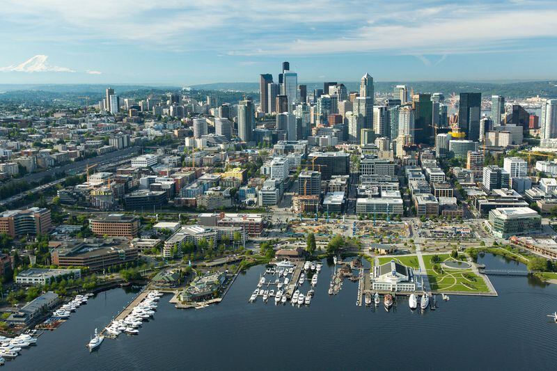 Seattle’s skyline seen from above the South Lake Union neighborhood where Amazon has built or leases many of its more than three dozen office buildings in downtown Seattle. Photo by Andrew Buchanan