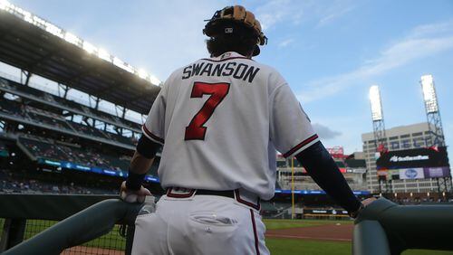 Braves shortstop Dansby Swanson, pictured going on the field in the first inning Wednesday, was out of the lineup Thursday for the first time all season. He was 3-for-33 in his past eight games to drop his batting average to .131. (Curtis Compton/ccompton@ajc.com)