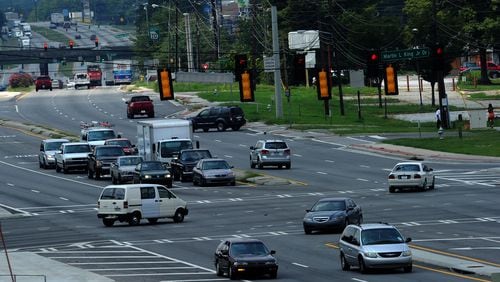 Vehicles travel through the intersection of Martin Luther King Jr. Drive and Fulton Industrial Boulevard near the Fulton County Airport. AJC FILE PHOTO