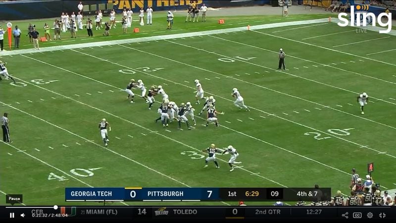 Georgia Tech defensive end Antwan Owens (at the 21-yard line) runs with the ball on a fake punt. The design of the fake was apparently to follow linebacker Brant Mitchell (center of the field at the 22-yard line) to the perimeter. (Screen grab of the broadcast by Fox Sports South.)