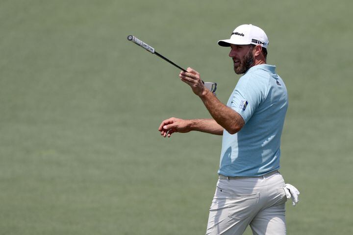 April 7, 2021, Augusta: Dustin Johnson reacts to his shot on the second hole during his practice round for the Masters at Augusta National Golf Club on Wednesday, April 7, 2021, in Augusta. Curtis Compton/ccompton@ajc.com
