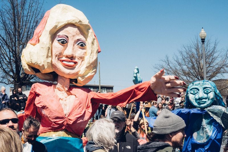 A giant Dolly Parton puppet was part of a parade in downtown Knoxville Saturday, March 26, that enlivened the Big Ears music festival. Photo: Chris Moyer