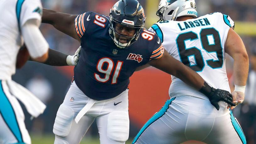 FILE - Chicago Bears nose tackle Eddie Goldman breaks through the Carolina Panthers offensive line during the first half of an NFL preseason football game, Thursday, Aug. 8, 2019, in Chicago. (AP Photo/Amr Alfiky, File)