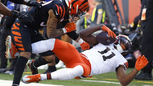 Donovan Peoples-Jones (11) of the Cleveland Browns is knocked out of bounds by Jessie Bates (30) of the Cincinnati Bengals during the fourth quarter at Paul Brown Stadium on Sunday, Nov. 7, 2021 in Cincinnati, Ohio. (Kirk Irwin/Getty Images/TNS)