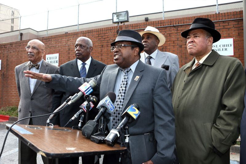The Rev. Timothy McDonald and members of the Concerned Black Clergy speak with the press outside the Fulton County Jail in this 2013 AJC file photo.
