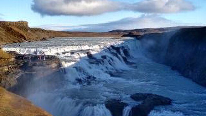 "This is a photo of the Gullfoss waterfall in Iceland, from an October trip," wrote Margaret Thomson of Marietta. "It plunges 105 feet down in two stages.  I have seen Niagara Falls, and this was much more impressive.  Also colder, a high of 33 every day we were in Iceland.  To get a feel for how huge it is, look at the people on the left."