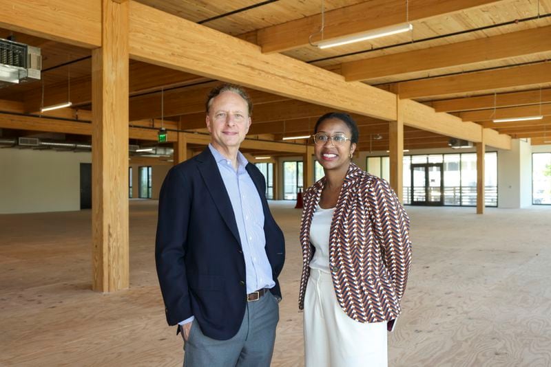 Matt Bronfman, CEO of Jamestown, left, and Alexandra Kirk, vice president of development & construction at Jamestown, are shown on the second floor of 619 Ponce next to Ponce City Market on Thursday, April 18, 2024, in Atlanta. Jason Getz / Jason.Getz@ajc.com)
