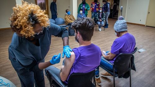 Vaccines, while not perfect, will reduce the chances you could transmit the virus to someone who can’t afford to get it. (Steve Schaefer for The Atlanta Journal-Constitution)