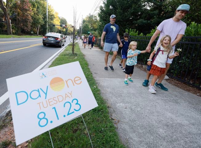 Parents and students arrive for the first day of school at Springdale Park Elementary School in Atlanta on Tuesday, August 1, 2023.   (Bob Andres for the Atlanta Journal Constitution)