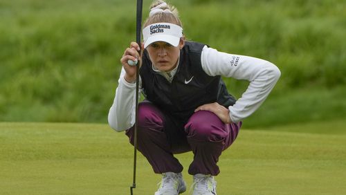 Nelly Korda lines up a shot on the 14th green during the first round of the Mizuho Americas Open golf tournament, Thursday, May 16, 2024, in Jersey City, N.J. (AP Photo/Seth Wenig)