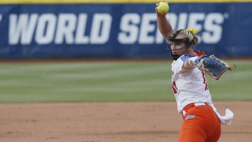 Kelly Barnhill pitching in the Collegiate Softball World Series. CREDIT: AP