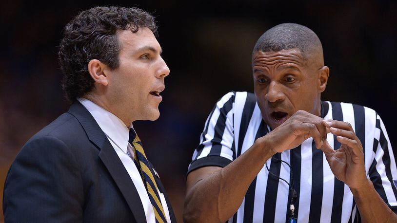 Head coach Josh Pastner of the Georgia Tech Yellow Jackets talks with official Ted Valentine during the game against the Duke Blue Devils at Cameron Indoor Stadium on January 4, 2017 in Durham, North Carolina. (Photo by Grant Halverson/Getty Images)