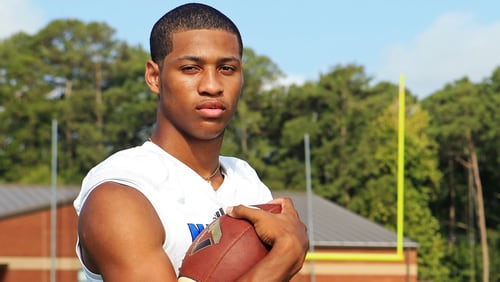Nyland Green, a senior defensive back at Newton High School, poses for a photo on Thursday, August 6, 2020, at Homer Sharp Stadium in Covington, Georgia. Green is one of the top 11 high school senior recruits in the state of Georgia for 2020.  CHRISTINA MATACOTTA FOR THE ATLANTA JOURNAL-CONSTITUTION.
