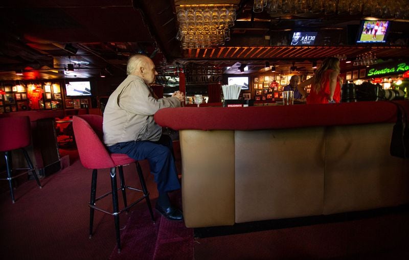 Dr. Stanley Isaacson sits at the bar at Johnny’s Hideaway on Roswell Sunday, May 31, 2020. STEVE SCHAEFER FOR THE ATLANTA JOURNAL-CONSTITUTION