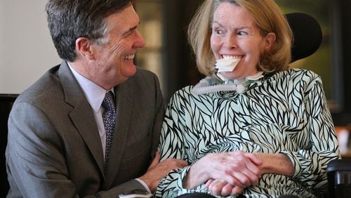 Mary Rose Taylor and her husband Dennis Lockhart shared a moment at their Buckhead condo in 2017. Well-known to Atlanta from her broadcast news and Margaret Mitchell House days, Taylor became a champion of the fight against neurodegenerative disease, while fighting her own battle against ALS. Curtis Compton/ccompton@ajc.com