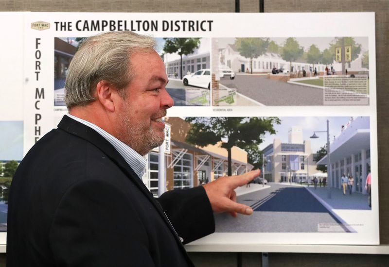 Developer Stephen Macauley describes the proposed Campbellton district to some audience members during the McPherson Implementing Local Redevelopment Authority Board Meeting at Fort Mac LRA in July in Atlanta. Macauley and the LRA have since parted ways. CURTIS COMPTON / CCOMPTON@AJC.COM