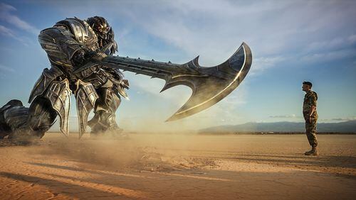 Megatron and Josh Duhamel as Lennox in a scene from “Transformers: The Last Knight.” Contributed by Paramount Pictures/Bay Films via AP