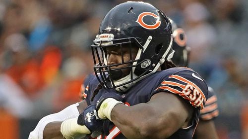 Pernell McPhee of the Chicago Bears celebrates after sacking Cam Newton of the Carolina Panthers at Soldier Field on October 22, 2017 in Chicago, Illinois. The Bears defeated the Panthers 17-3.  (Photo by Jonathan Daniel/Getty Images)