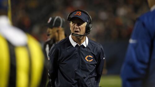 Chicago Bears head coach John Fox talks on his headset during the first half of an NFL preseason football game against the Cleveland Browns, Thursday, Aug. 31, 2017, in Chicago. (AP Photo/Nam Y. Huh)