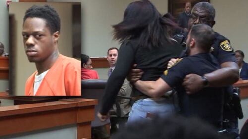 Tashiya Campbell had to be restrained Thursday after lunging at shooting suspect Tevin Merriweather.