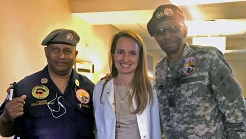 Senior Staff Attorney Carlissa Carson (center) is with two of the veterans receiving assistance from the Emory Law Volunteer Clinic for Veterans. (Courtesy of Emory University)