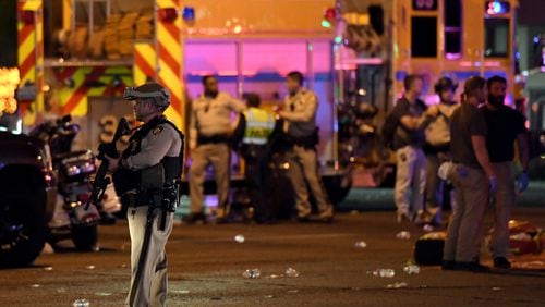 LAS VEGAS, NV - OCTOBER 02:  A Las Vegas Metropolitan Police Department officer stands in the intersection of Las Vegas Boulevard and Tropicana Ave. after a mass shooting at a country music festival nearby on October 2, 2017 in Las Vegas, Nevada. (Photo by Ethan Miller/Getty Images)