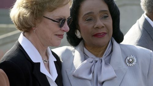 ATLANTA, GA. - Former U.S. first lady Rosalynn Carter (left) chats with Coretta Scott King (right) following ceremonies marking the 20th anniversary of the Martin Luther King, Jr. National Historic site and Preservation District on Auburn Ave. in Atlanta. Former U.S. Jimmy Carter was keynote speaker during the public ceremony. (CATHY SEITH/AJC FILE PHOTO)