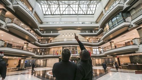 March 23, 2018 Atlanta: Employees at Atlanta City Hall were handed instructions as they come through the front doors to not turn on computers or log on to their workstations on Friday March 23, 2018. Friday&apos;s action comes as city officials are struggling to determine how much sensitive information may have been compromised in a Thursday cyber attack. The city has also received demands that it pay a ransom of an unspecified amount, officials confirmed. But officials had yet to make a determination if it would pay the ransom. Hartsfield-Jackson International took down the wi-fi at the world&apos;s busiest airport after a cyber attack on the city. The Atlanta airport&apos;s website said after the cyber attack that security wait times and flight information may not be accurate. JOHN SPINK/JSPINK@AJC.COM