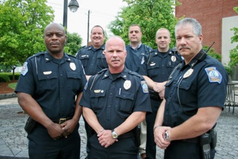 The Douglasville police command staff in 2014. Front Row from left: then-Deputy Chief Gary Sparks, then-Chief Chris Womack and Capt. Darren Shaw. Back Row from left: Maj. Greg Graff, then-Capt. Zach Ardis and then-Capt. J.R. Davidson. (BILL TORPY / BTORPY@AJC.COM)