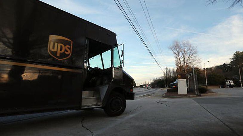 UPS delivery trucks returning to the UPS facility on Pleasantdale Rd in Doraville.